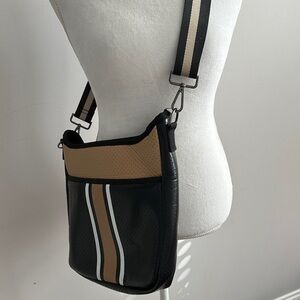 Black & Tan Crossbody Bag by Haute Shore.